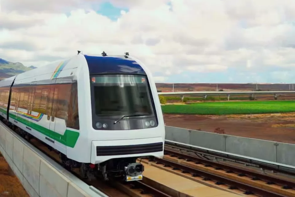 Rendering of white Honolulu light railtrain speeding past landscape